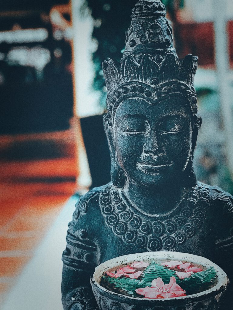 Pandanus resort Mui Ne Statue with flowers